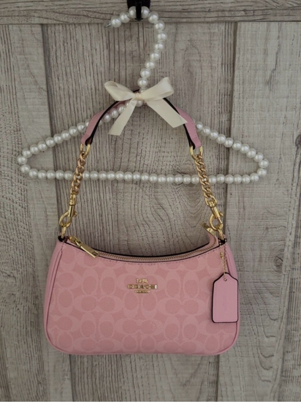 Coach Pink Signature Canvas Shoulder Bag with Gold Hardware